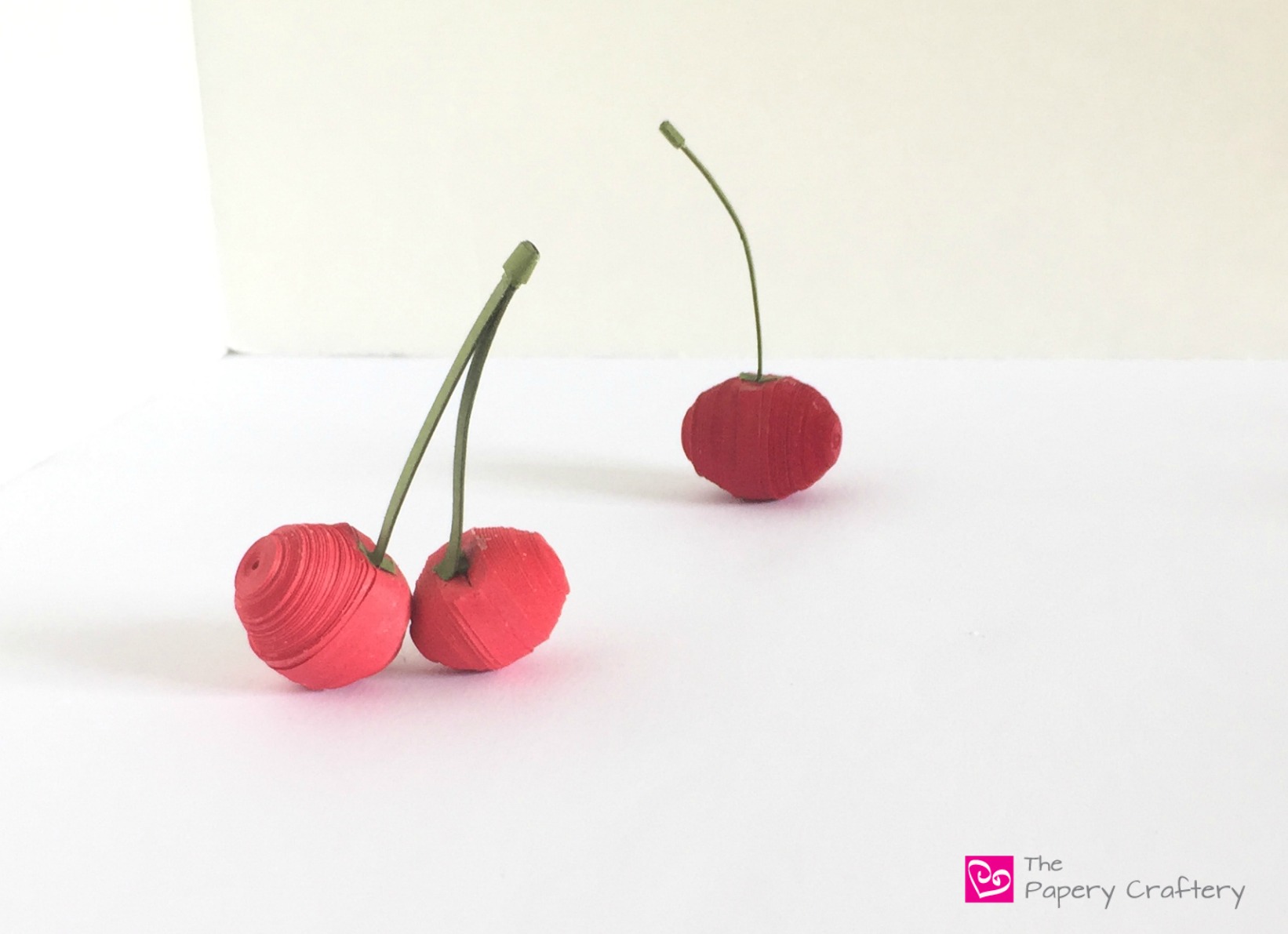 https://www.thepaperycraftery.com/wp-content/uploads/2017/05/Steps-to-Making-Quilling-Paper-Cherries-www.thepaperycraftery.com_.jpg